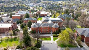 Explore an aerial perspective of Washington State University's stunning architecture and lush campus.