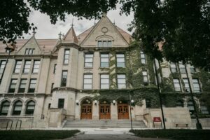 Majestic ivy-covered Gothic architecture of a historic university building in Chicago.