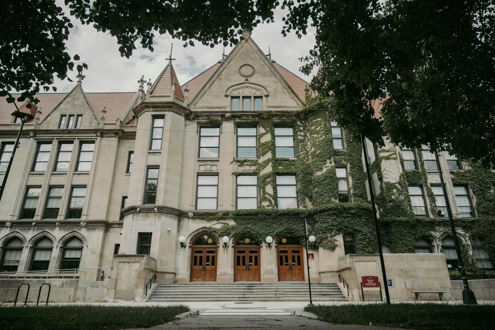 Majestic ivy-covered Gothic architecture of a historic university building in Chicago.
